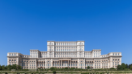 Fototapeta na wymiar Romanian Parliment building was designed by team of 700 architects in Socialist realist and modernist Neoclassical architectural forms and styles with socialist realism in mind, Bucharest