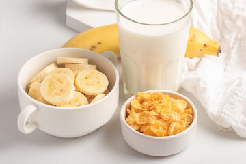 Cornflakes breakfast, banana, fresh milk, healthy food