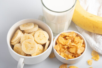 Cornflakes breakfast, banana, fresh milk, healthy food