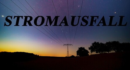 Power outage text (Stromausfall on german)  on starry sky background. The energy crisis in Europe...
