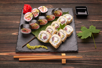 Sushi set on a wooden background with ginger