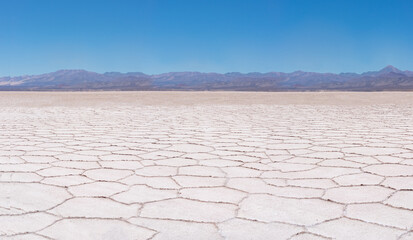 Salinas Grandes salt flat desert in provinces of Salta and Jujuy, located in the  Puna of Atacama, Northwest Argentina. - obrazy, fototapety, plakaty