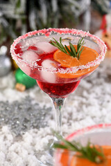 Christmas Cranberry margarita cocktail is mandarin and rosemary combined with cranberries and tequila. This cocktail is bursting with vibrant citrus and herb aromas, showcasing the best winter season 