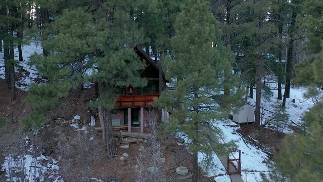 Cabin in the mountains aerial video in Flagstaff, Arizona