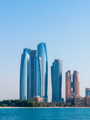 Business Area in Downtown Abu Dhabi, United Arab Emirates on a sunny afternoon - shot from across the water