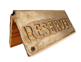Metallic table tent for reservation in vintage style isolated on white background. Reservation concept.