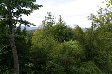 Beautiful scenic landscape at Canton Zürich seen from famous castle Kyburg on a blue cloudy summer day. Photo taken September 1st, 2022, Kyburg, Switzerland.