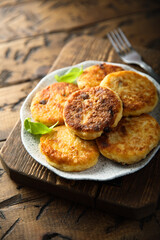 Homemade savory potato pancakes with fresh basil