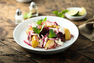 Beetroot salad with apple and goat cheese