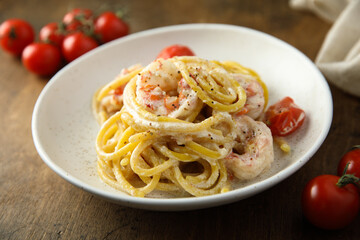 Homemade pasta with shrimps and cream