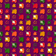 Seamless pattern with red, green, yellow, and orange scotch bonnet peppers. Capsicum chinense. Hot chili pepper. Vegetables. Vector illustration isolated on purple background. Flat style.