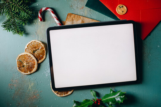 digital tablet mockup, laptop with white screen, mock up on christmas background