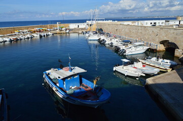 Fototapeta na wymiar panorama to the historic center and port of Gallipoli with boats and ships
