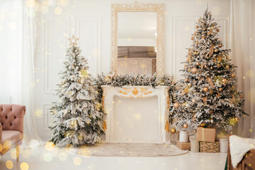 Two decorated Christmas trees on the sides of the hall and a fireplace in the center. Christmas and New Years with rich traditional home decor. Candles gifts in boxes and Christmas toys for christmas.
