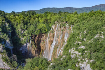 Majestic view of biggest waterfall with crystal clear water in forest in The Plitvice Lakes National Park in Croatia Europe.