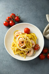 Homemade pasta with shrimps and cream
