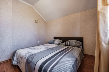 interior of cheapest bedroom in studio apartments or hostel