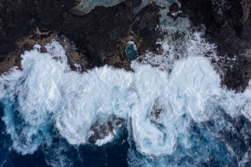 Sea waves breaking in the coast