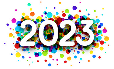 White paper 2023 sign on colorful round spot confetti background.