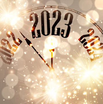New year clock showing 2023 with golden firework and bokeh lights.