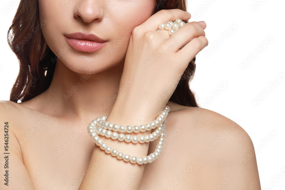 Sticker Young woman with elegant pearl necklace on white background, closeup