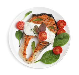 Tasty salmon steak with basil and tomatoes on white background, top view