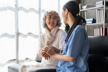 Home healthcare nurse, physical therapy with senior adult woman at home