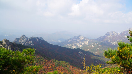 The peaks of Bukhansan Mountain in autumn, Wonhyo, Uisangbong, and Baegun.