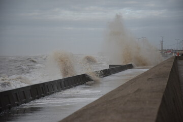 Huge waves crashing over the sea wall. Taken in Blackpool Lancashire England. 