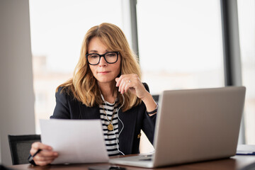 Executive businesswoman having video call at the office