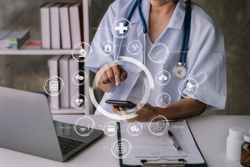 Medical Technology Concepts. Medical use mobile phones to search for information in a modern office in the morning at the desk.