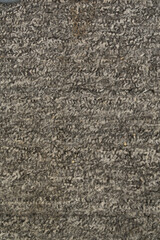 texture of gray soft fleecy carpet close up