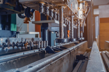 milling press drilling a copper plate. A fast shutter was used. Focus is on the point where the milling edge plate.