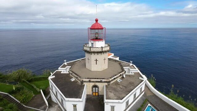 aerial view of the sea lighthouse on the rock Farol Da Ponta Do Arnel- Sao Miguel Azores 15 octobre 2022