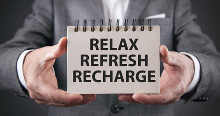 Relax, Refresh, Recharge on notepad.