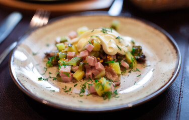 Salad with potatoes, sour cream and mushrooms