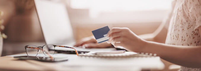 Woman at office trying to moke e-pay.