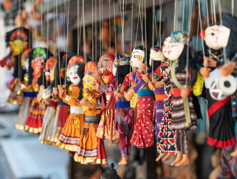 Traditional nepalese puppets on strings for sale in a souvenir shop in the Thamel area of Kathmandu city, Nepal