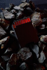The micro sd card lies on hot coals. Close-up