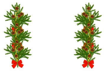 Pine tree branches with cones and red ribbon bow decoration isolated on white.