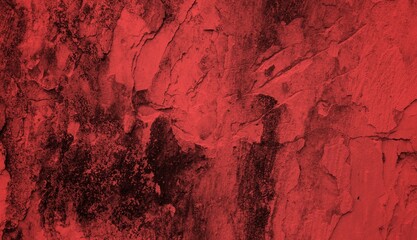 A textured background featuring deep red tones with a distressed, grunge appearance. The surface shows scratches and uneven patterns, creating a vintage feel.