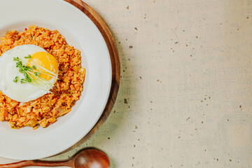 Kimchibokkeumbap, Korean Kimchi Fried Rice : Rice fried with finely chopped kimchi. Beef, pork, onions, green onions, and other vegetables may be added according to taste.