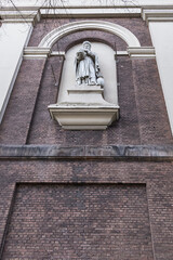 Moses and Aaron Church (Mozes en Aaronkerk) at Waterlooplein neighborhood is officially Roman Catholic Church of St. Anthony of Padua (Sint-Anthoniuskerk, 1841). Amsterdam, The Netherlands.