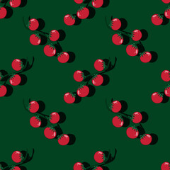 Seamless pattern with cherry tomato on green background. Print for fabric and kitchen wallpaper.