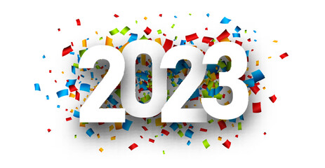 White paper 2023 sign on colorful confetti background.