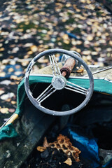 Abandoned Amusement Car Ride in Ghost City of Pripyat in Chernobyl Exclusion Zone, Scooter in Autumn Colors