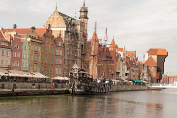 Fototapeta na wymiar near old town of Gdansk, ships on the river named motlawa