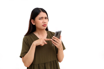 Unhappy expression of young asian woman with her phone. Isolated on white background with copyspace