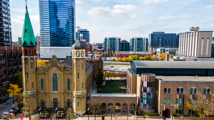 Fototapeta premium Chicago, IL USA October 15th 2022: aerial drone shot of a local church in the hear of downtown the beautiful modern architecture brings in tourist and travelers alike 