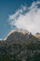 Rocky peak of the mountain. Sunny day in the European mountains.